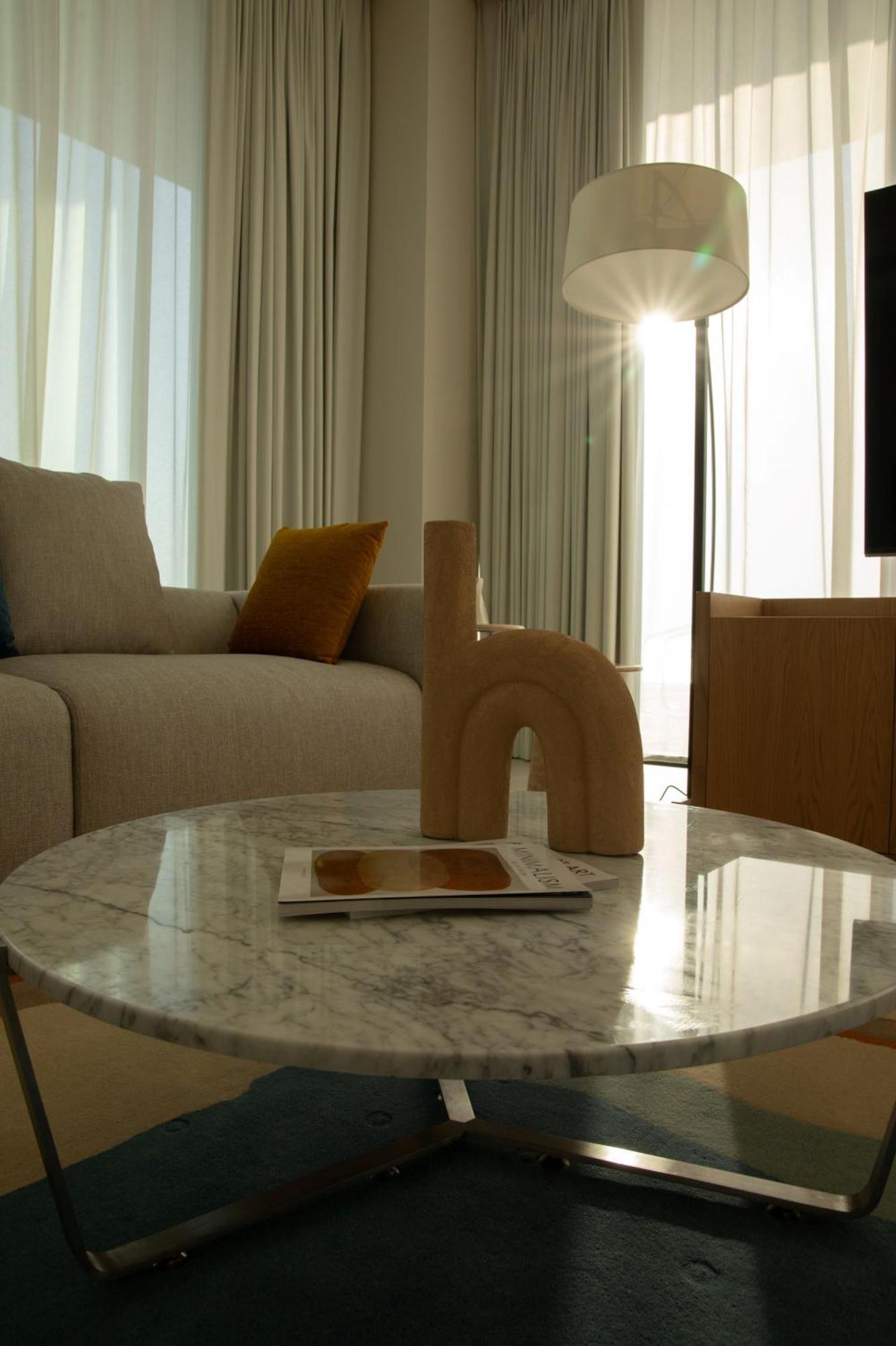 Ajman Hotel & Villas By Blazon Hotels Luaran gambar A 3D rendering of a living room