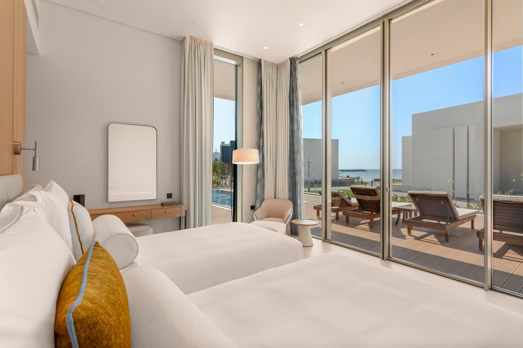 Ajman Hotel & Villas By Blazon Hotels Luaran gambar A bedroom at the hotel